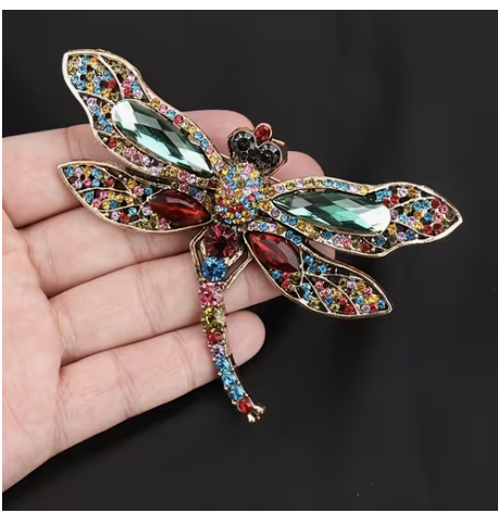 Large multicoloured crystal dragonfly brooch with green stone wings